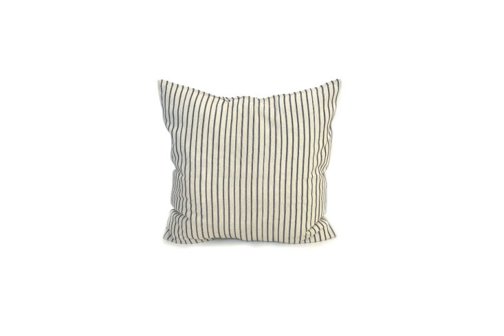 the tensira cushion in natural navy stripe is \$\100 at diani. 27