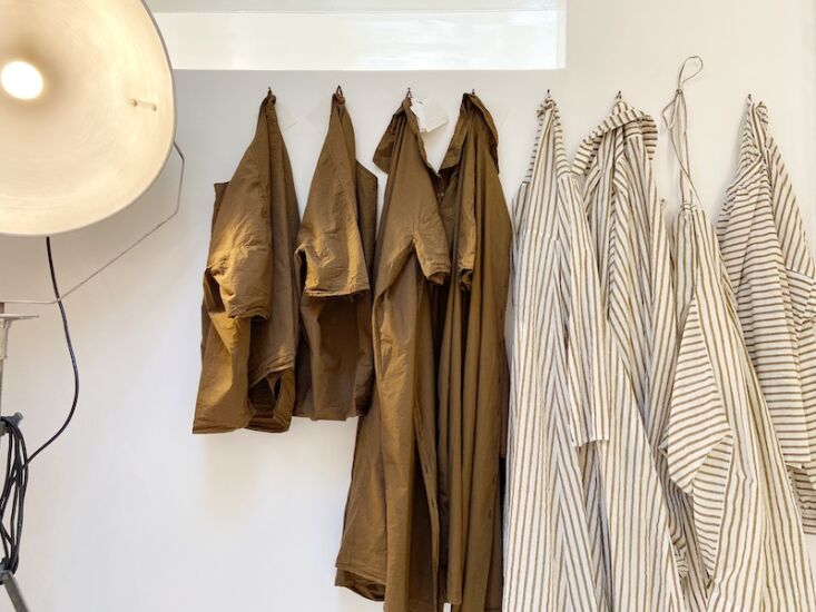 stripes and khaki, hung side by side. 21