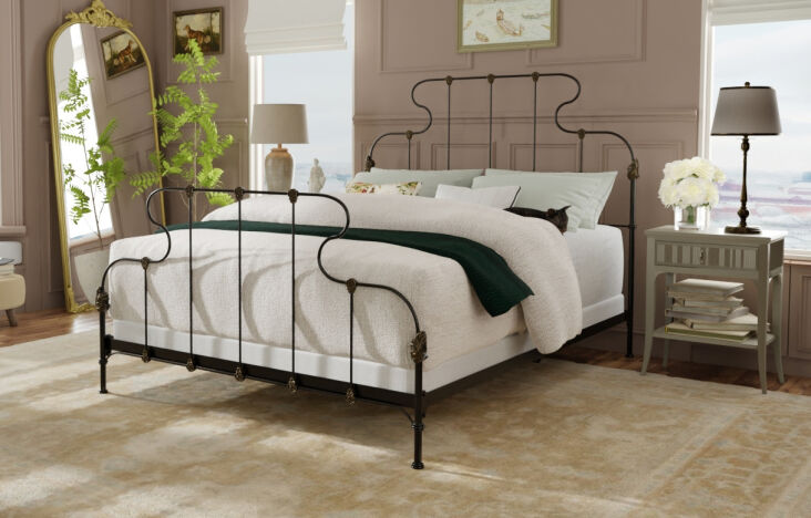 above: the ana bed is made from solid iron with hand cast details and “h 18