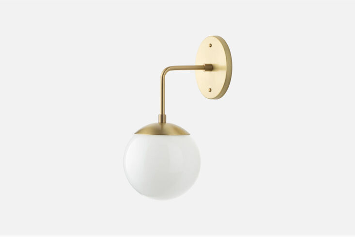 the the antique cafe lamps seen in the kitchen were sourced from vinterior. for 26