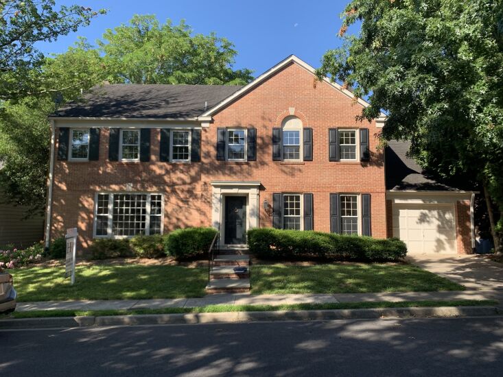 the brick colonial was built in the \1980s. 30