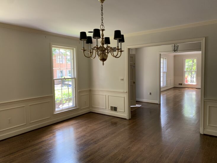 a view from the dining room of the center hall entry: the plan was traditional 31