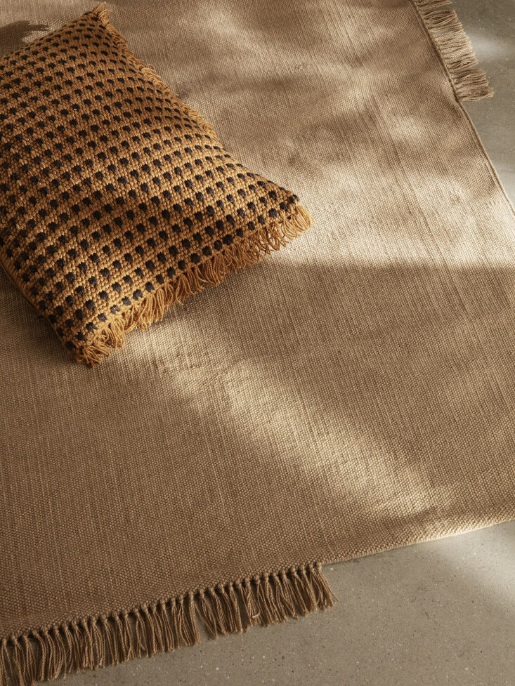 the ferm living hem rug is made from repurposed pet yarn; starting at \$\145. 22
