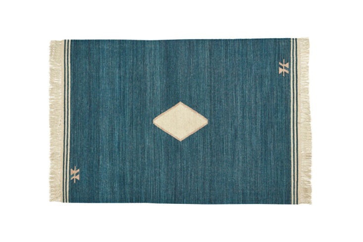 and the finn flatweave rug is currently on sale for \$\239 from revival. 30
