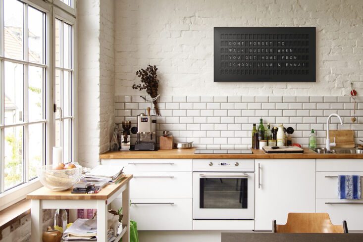 a vestaboard in the kitchen becomes a warm and inviting way to communicate with 19
