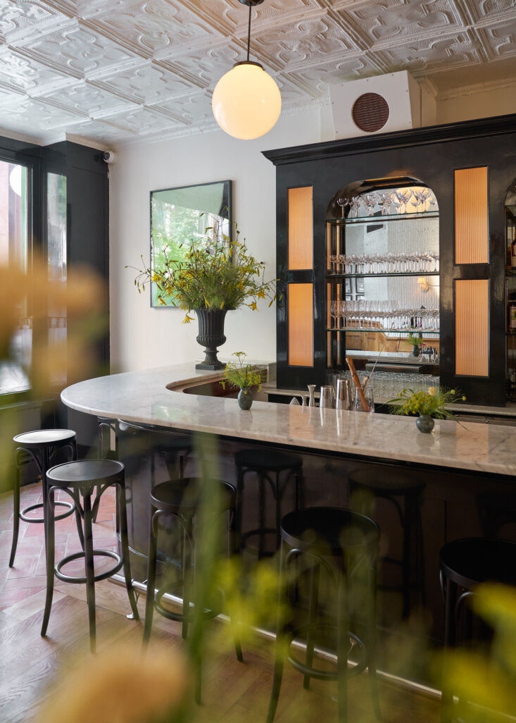 to achieve the ideal radiance for the custom sconces and the cabinets behind th 23