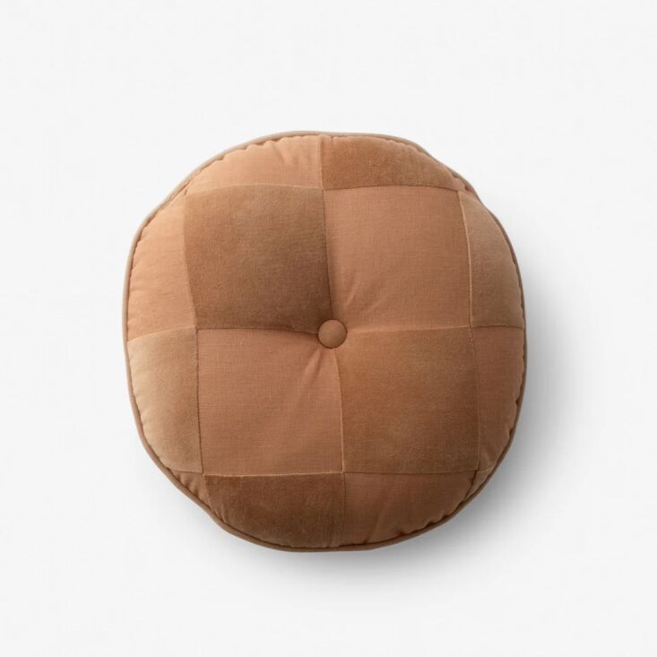 from schoolhouse x clare v., the pablo velvet + linen circle pillow is \$99 and 25