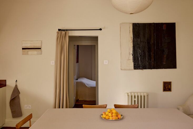 the view from the dining area, through the hall, to the bedroom. 22