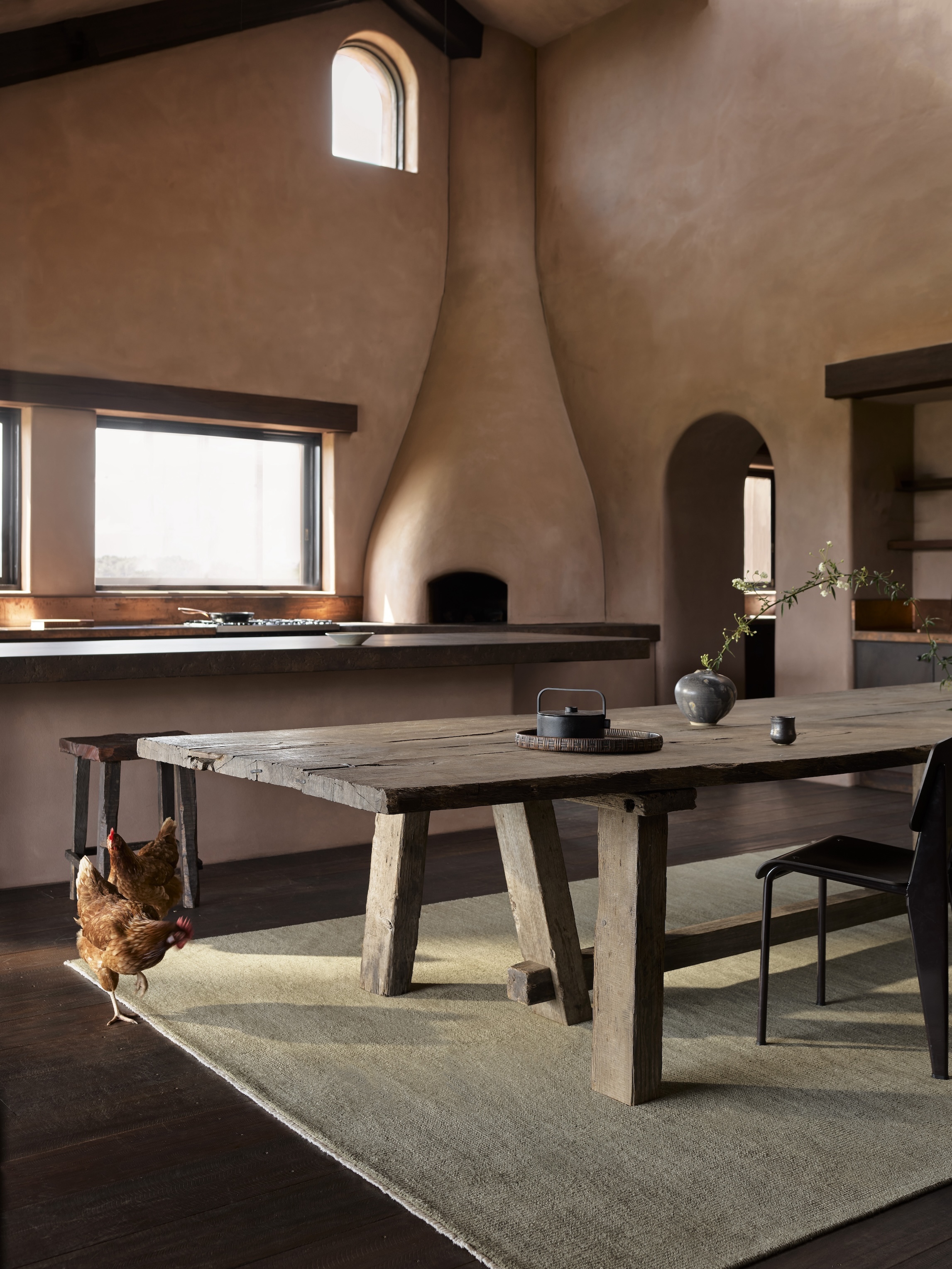 the impressive plasterwork extends to the farmhouse style kitchen, which has a 22