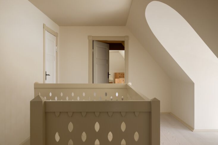 the staircase continues with a custom surround designed in almond shaped cutout 28