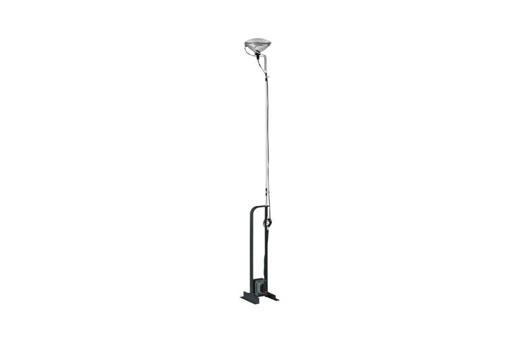 the standing lamp with a metal base and exposed cord is the flos toio led lamp, 24