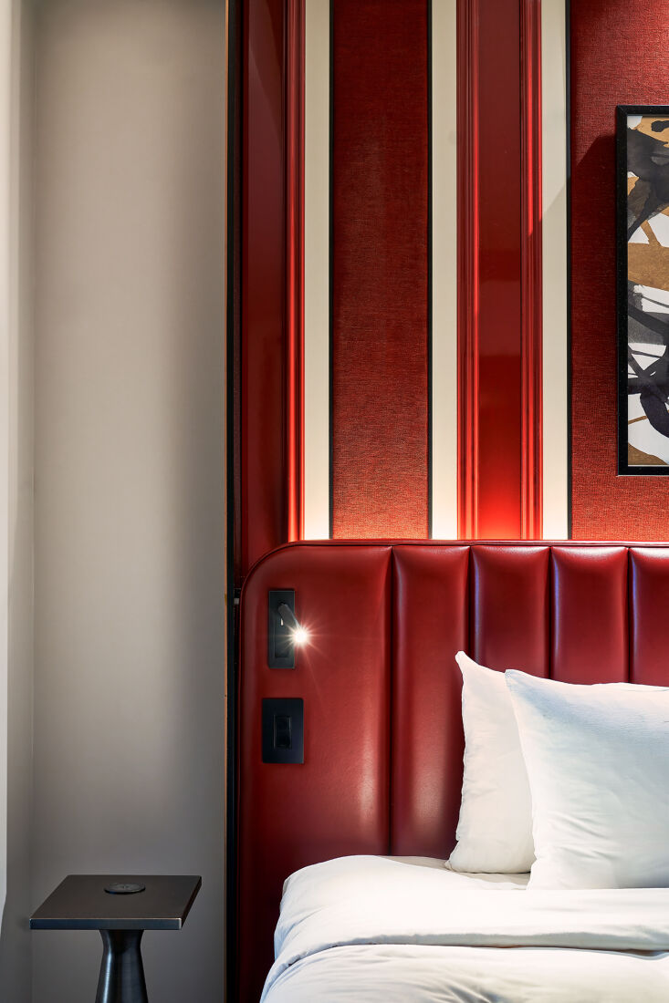 each plush leather headboard disguises a practical detail: a built in reading l 19