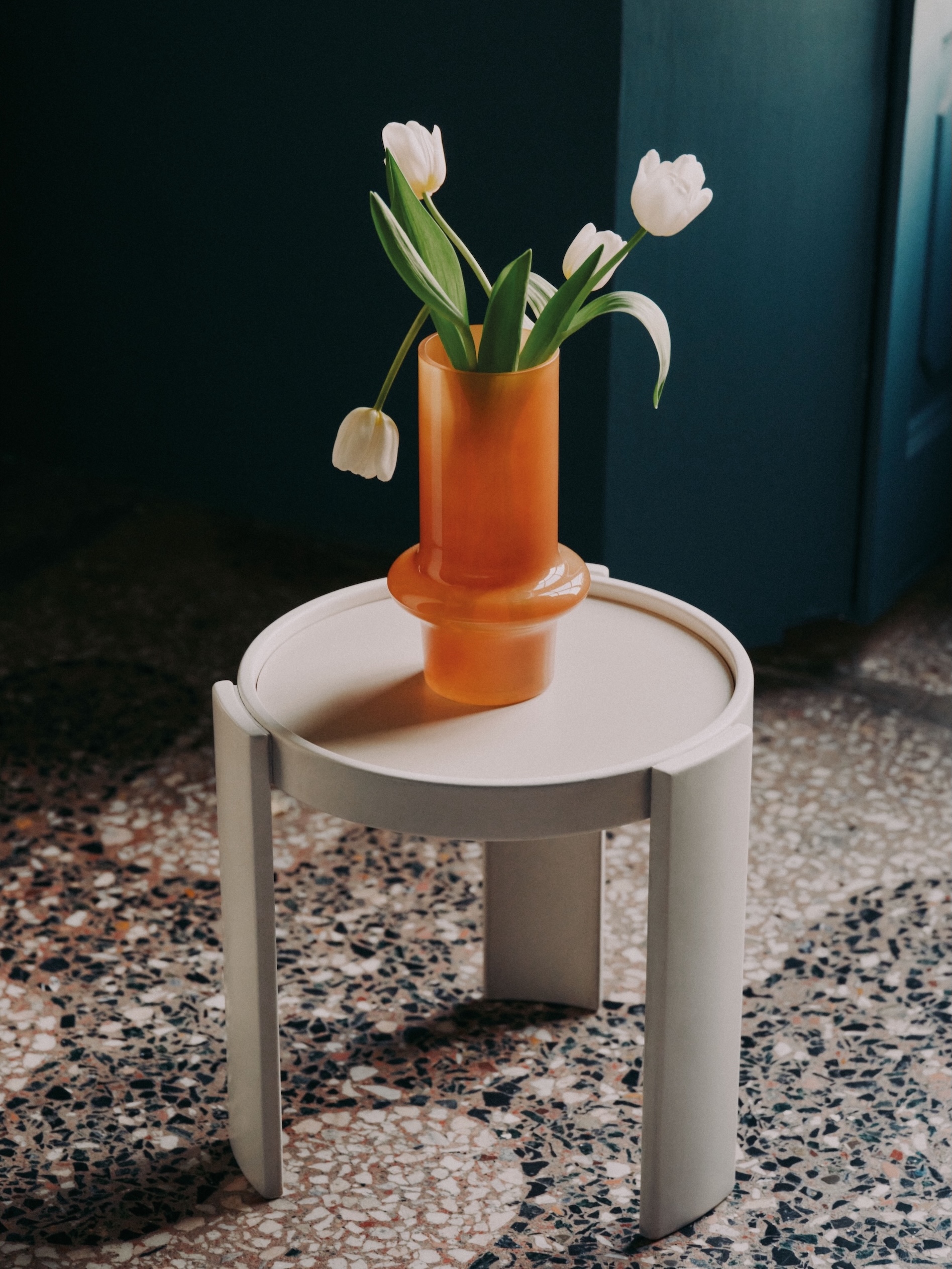 the cylindrical glass vase, here in ochre, is \$\29.99. the pie ces in the coll 17