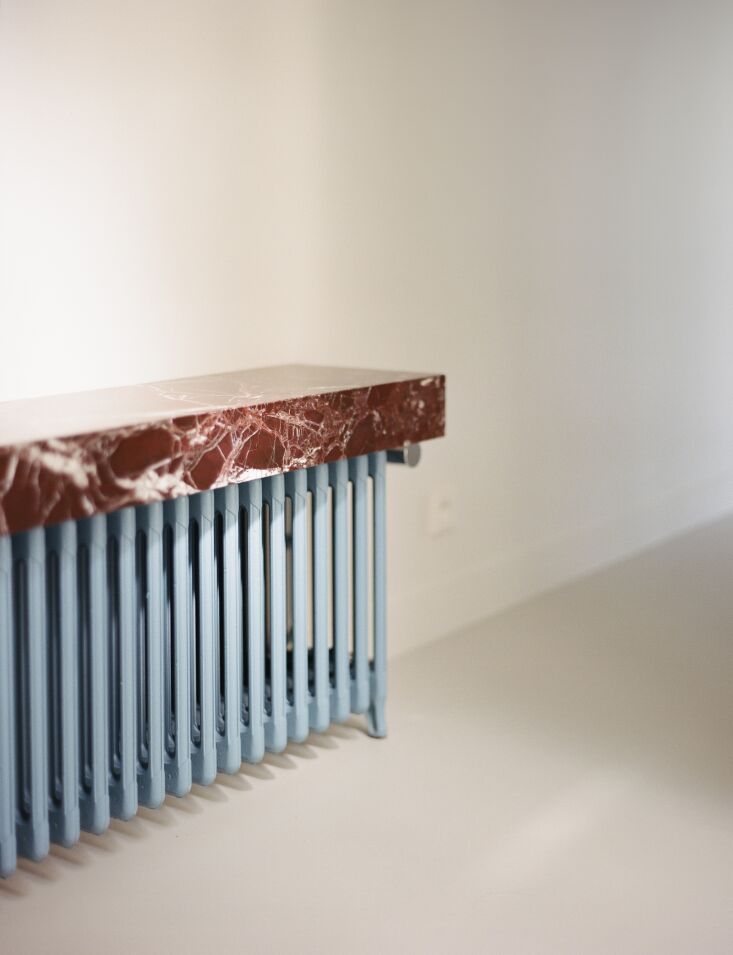 the marble slab integrated on the top of the ral 50\24 pastel blue radiator is  22