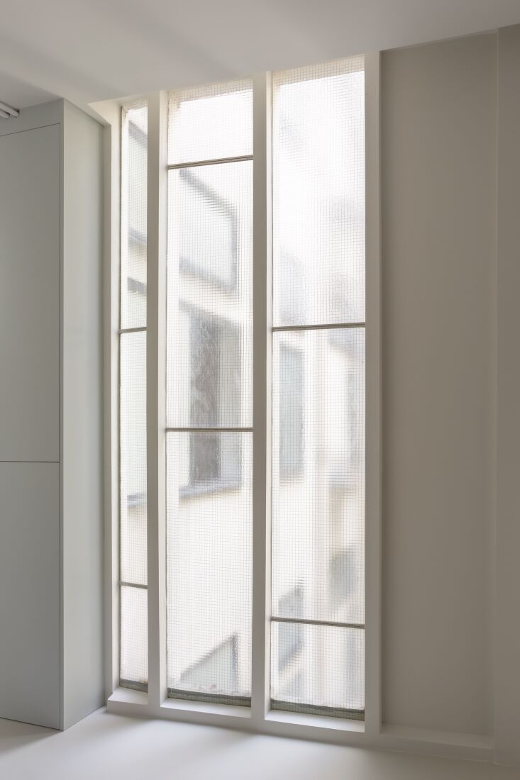 the original glass of the building with walls newly painted in farrow & bal 23