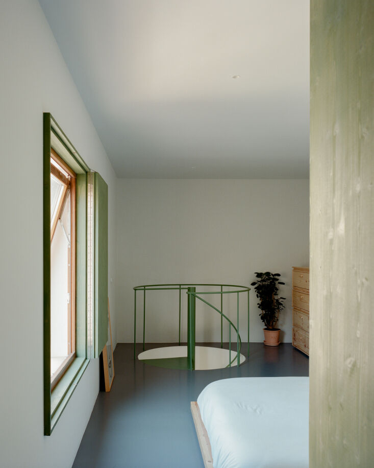 the spiral staircase leads to the bedroom. 23