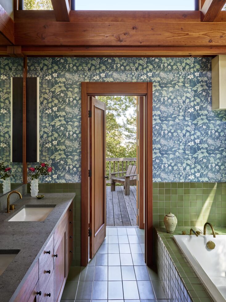 the bathroom consoles feature the same limestone as seen in the kitchen. 33