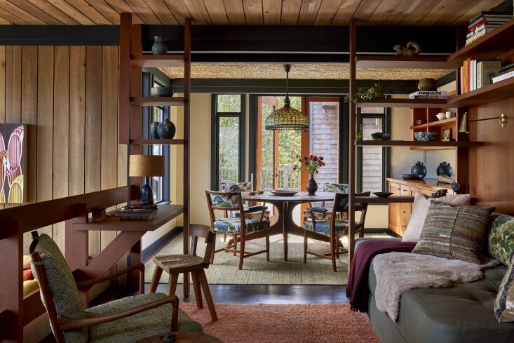 a view from the kitchen through a sitting area and into the dining room. 21