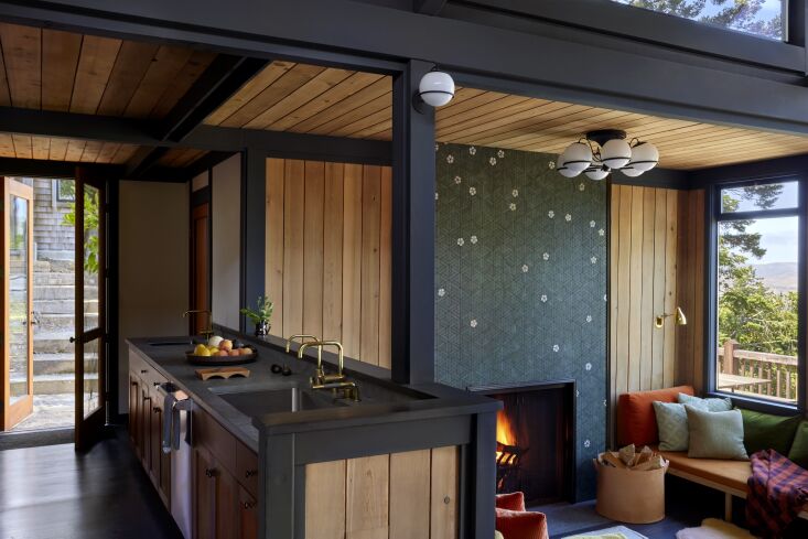 the kitchen countertops are fossil green limestone which are leathered from ful 19