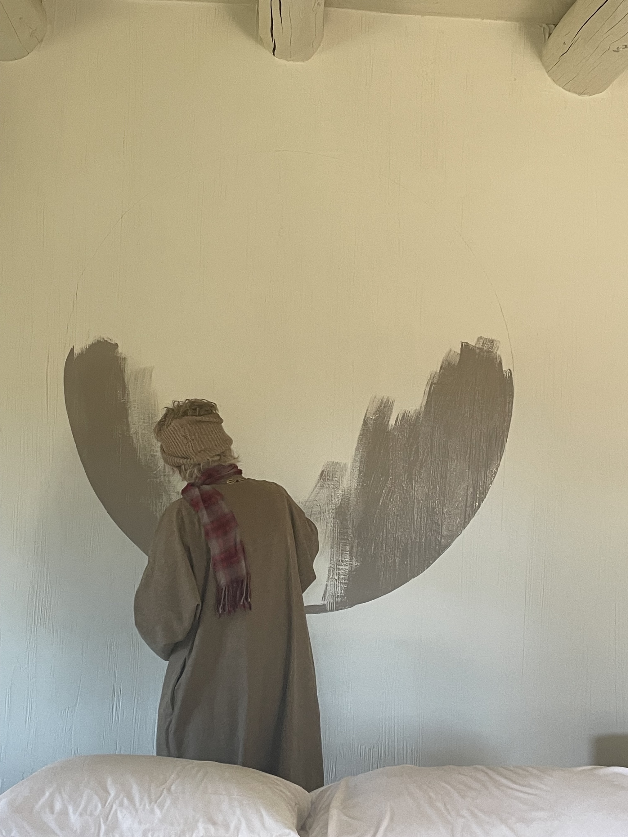 artist/designer patricia larsen paints a circle mural in photographer dani brub 17