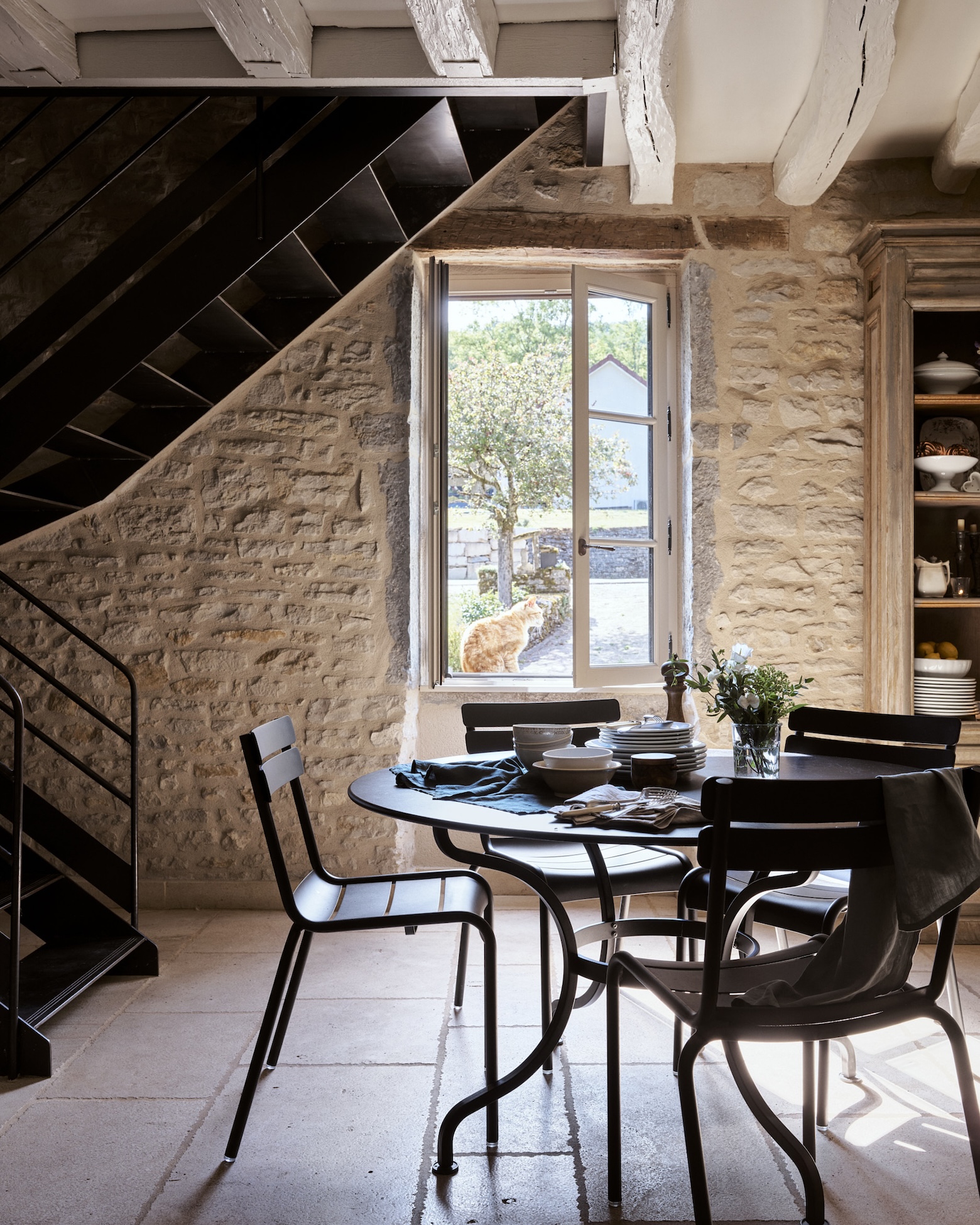 fermob\2\17;s luxembourg side chairs and opera table serve as the family 21