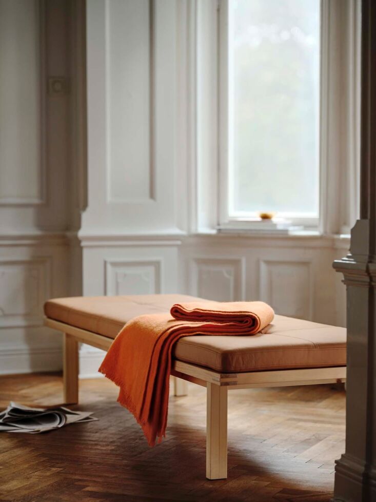 the stockholm bench with pad, topped with leather, is \$399. pair with paulin m 20