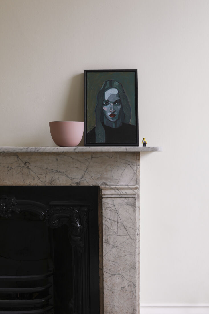 a painting by artist poppy ellis on the living room memo. living room walls are 35