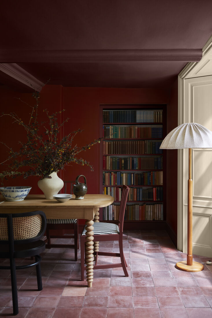 bronze red and arras make for a moody, rich dining room. 24