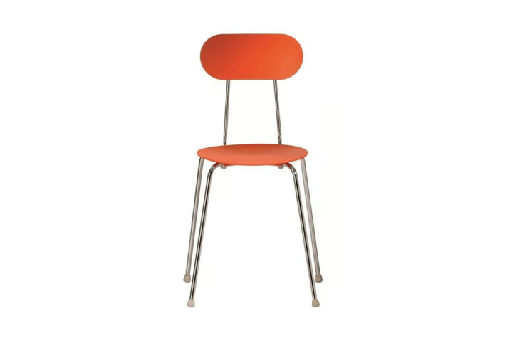 the dining chairs are orange mariolina chairs, designed by enzo mari for magis. 24