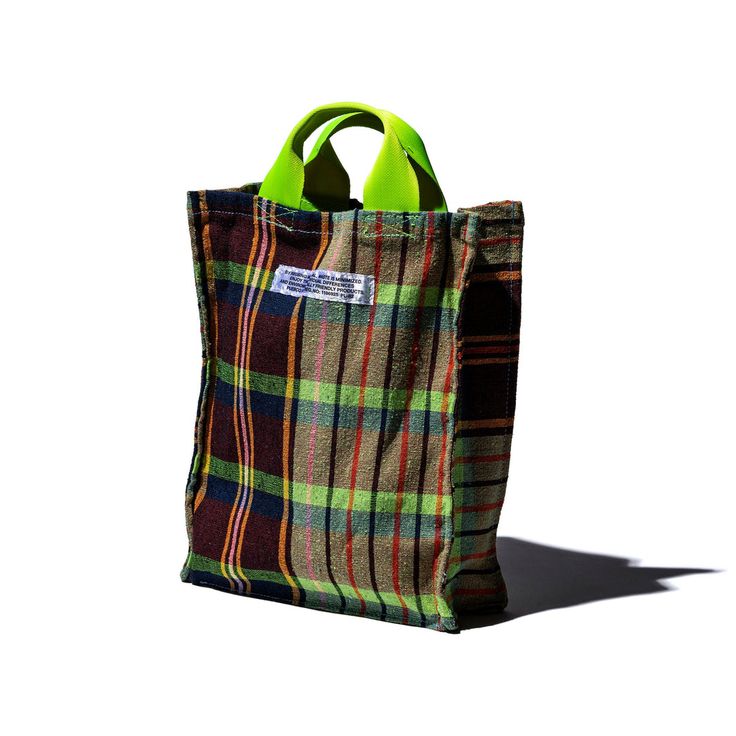 the document bag of recycled plaid fabric and used belt webbing, \$48 from the  23
