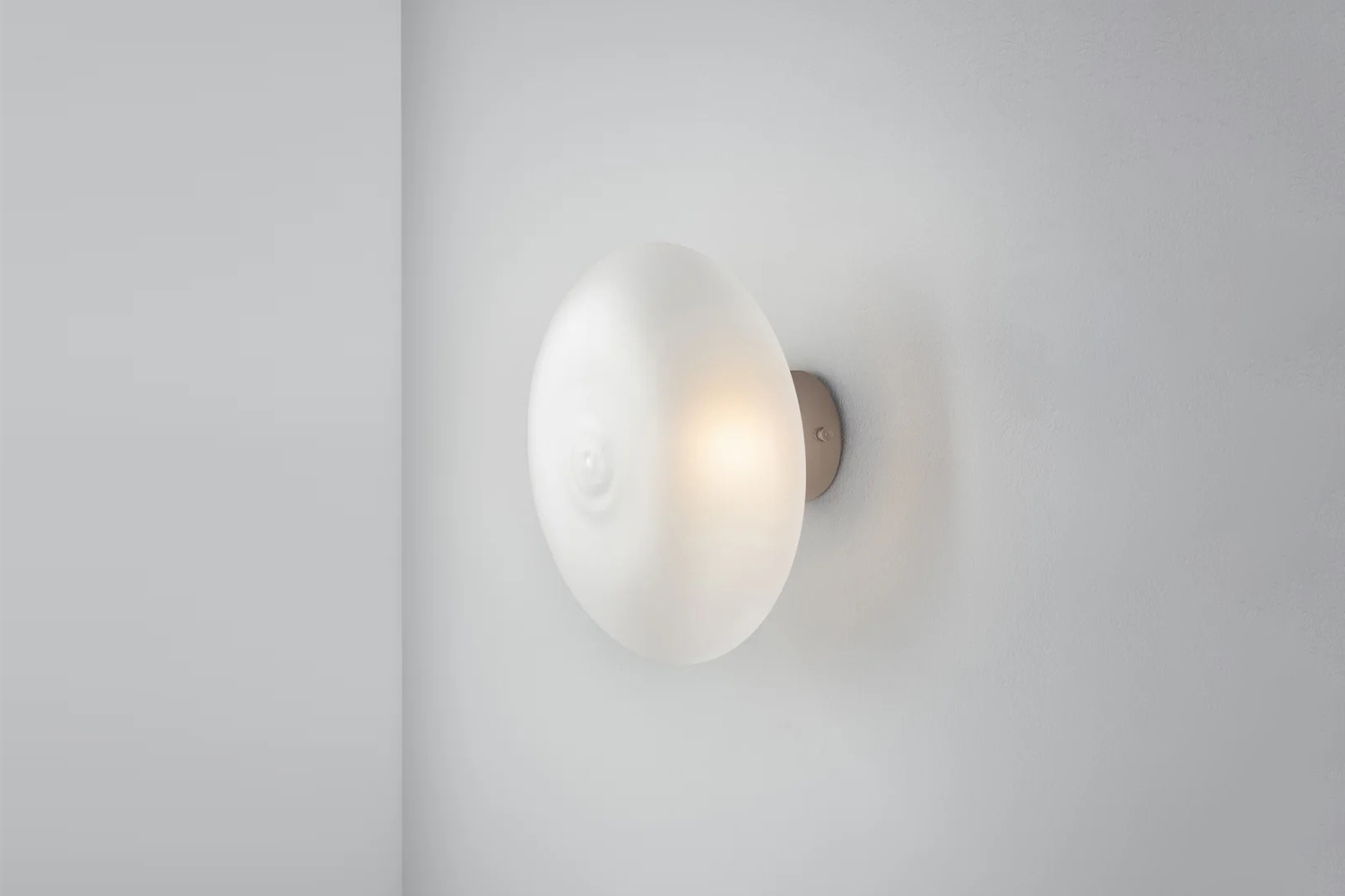 from cairo lighting studio sal, the halo sconce diffuses light through an organ 19