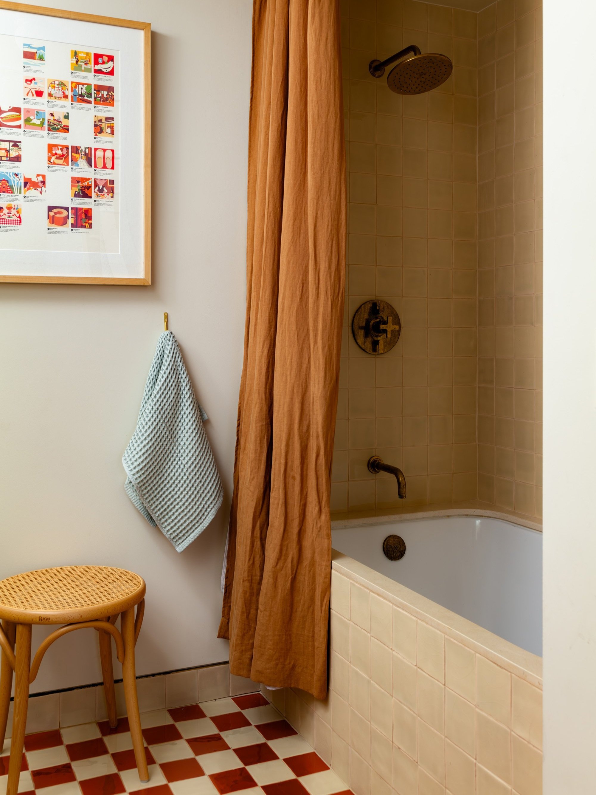 a new bathtub and uplifting field tiles in burnt sienna and vanilla cream from  28