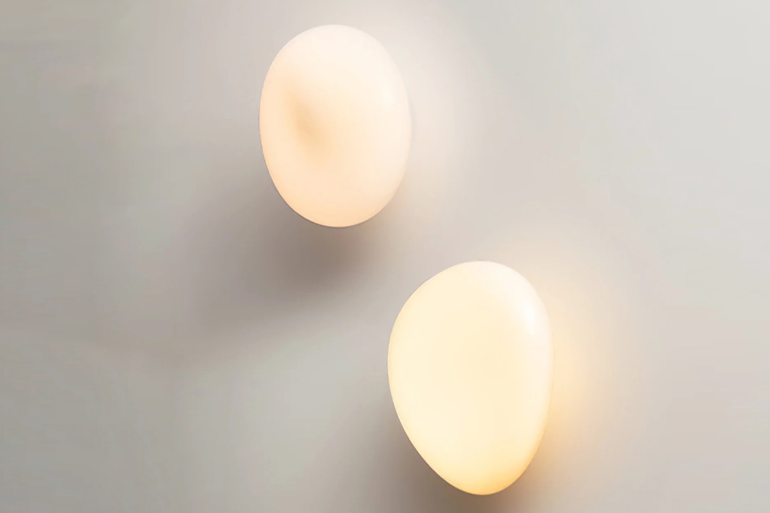 the bubble glass wall lamp is an organic, sculptural shape in blown glass; \$\1 25