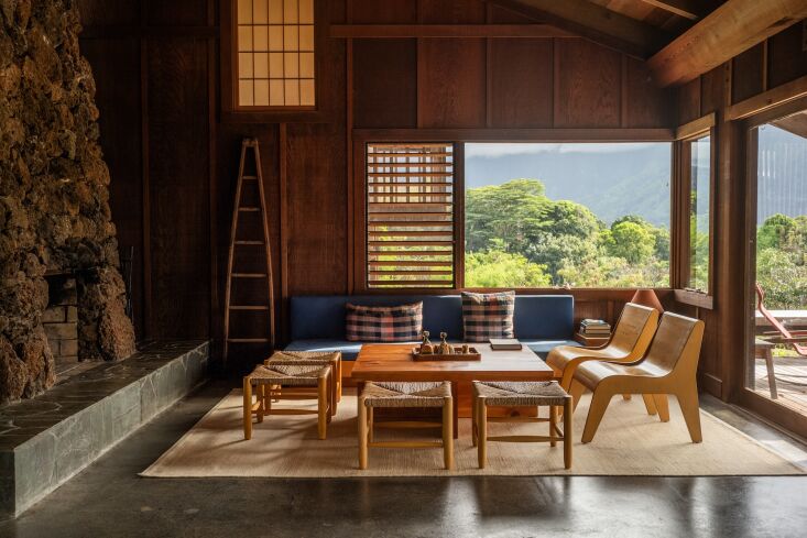 to the left is the original floor to ceiling lava rock fireplace. the louvers f 20