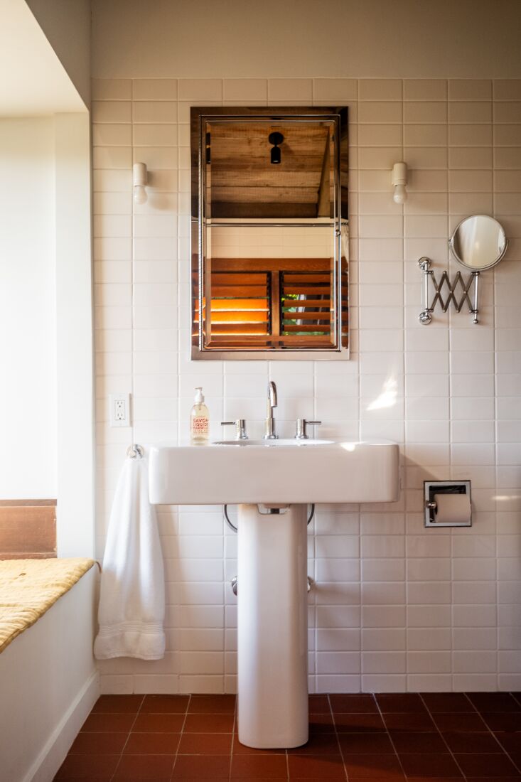 the bathrooms were fully redesigned working with matte white tile, restoration 30