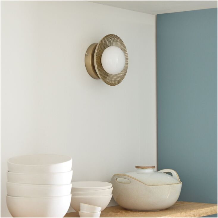 the bezel perforated metal sconce is \$\289 from west elm. 18