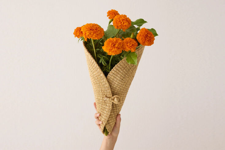a flower cone basket by baba tree really upgrades a bundle of market flowers. t 17