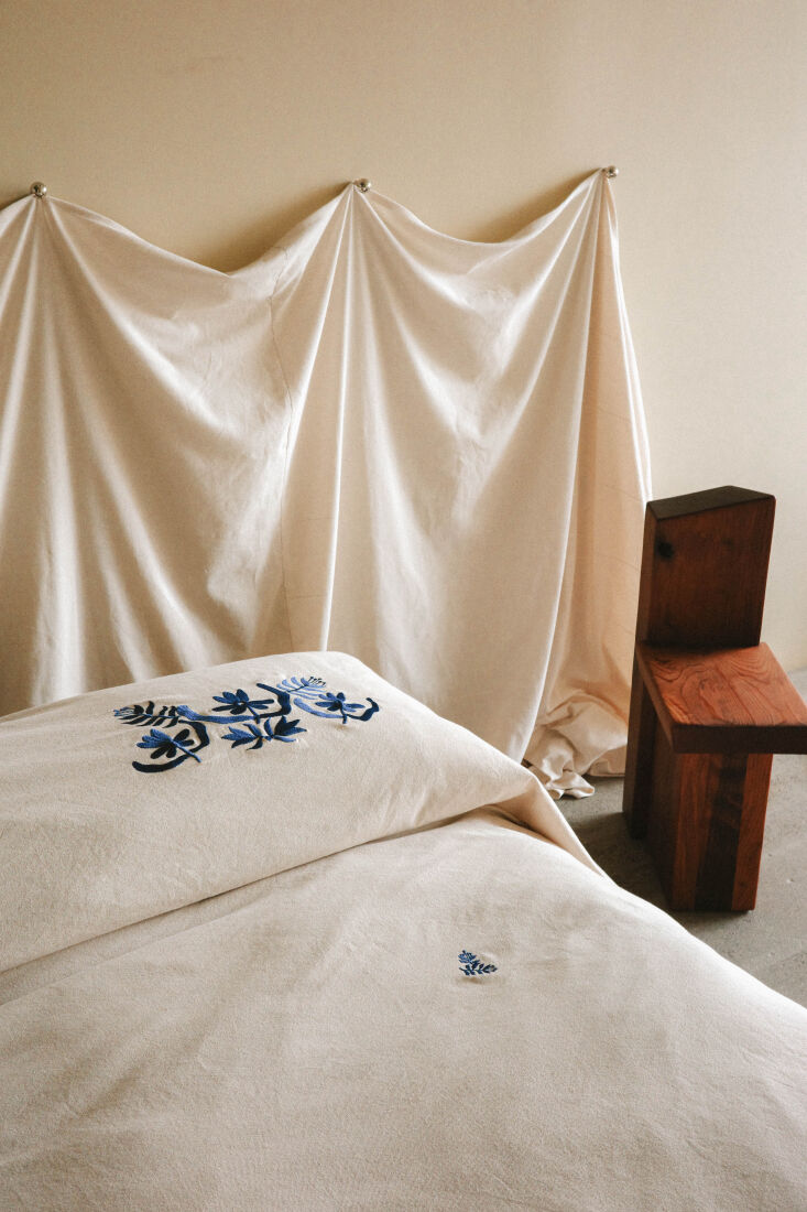 a simple white sheet pairs well with the embroidered, heirloom like marta cover 19