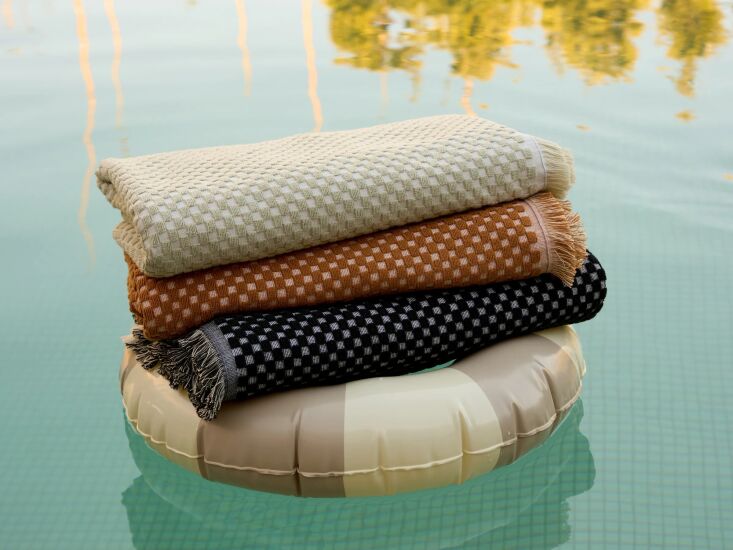 the jacquard weave riviera beach towel has the look and feel of a throw but the 17