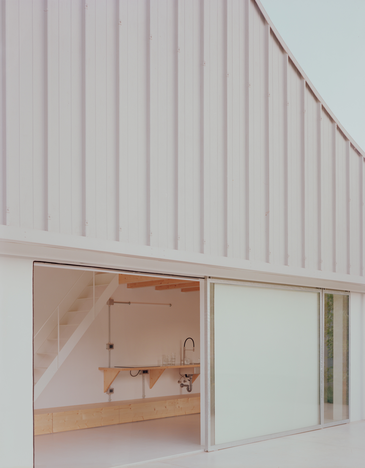 the architects introduced an enlarged entry that now opens to an airy mini kitc 19