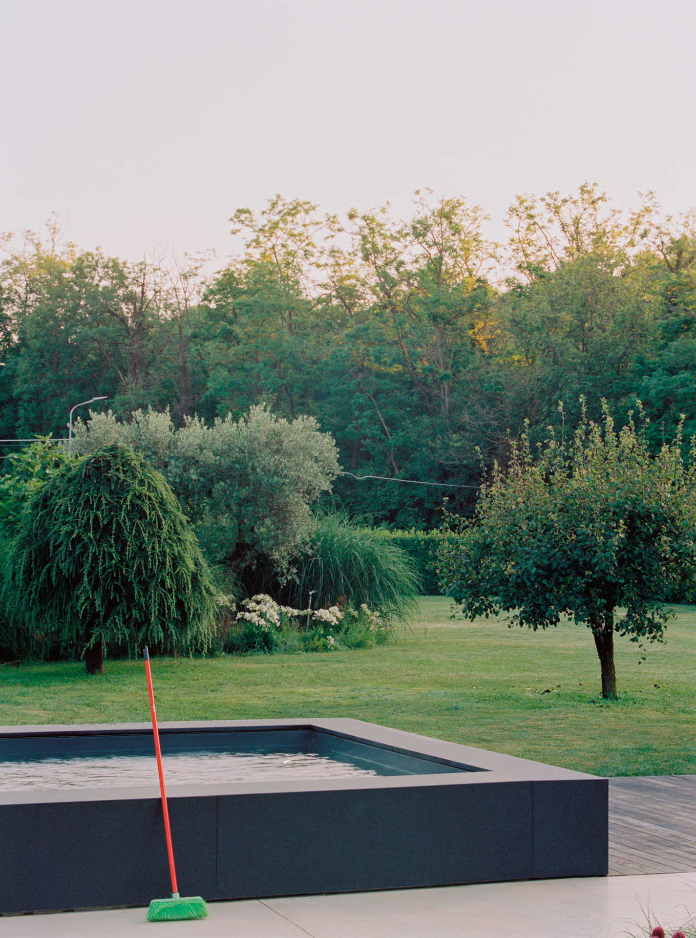 the pool, also finished in black granite, is, the architects write, &#8\2\2 26