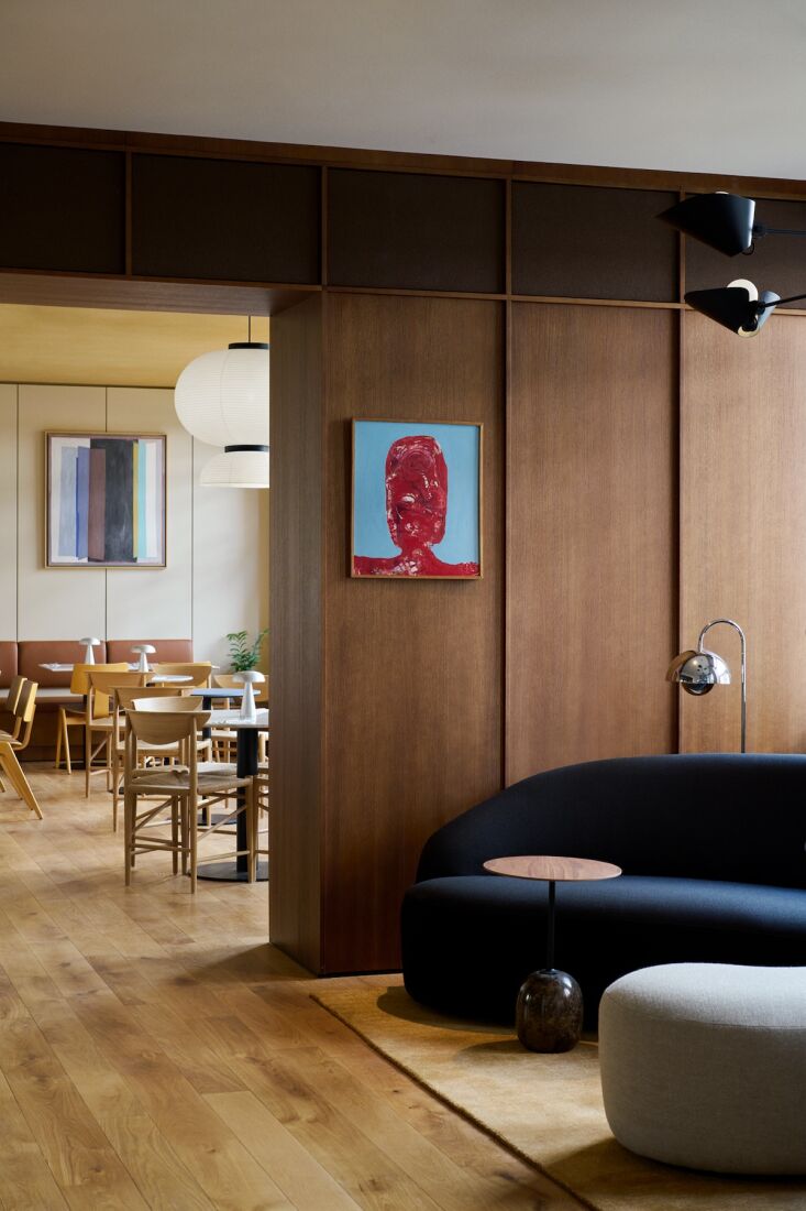 to the right, a sitting area marked by the margas series by louise liljencrantz 18