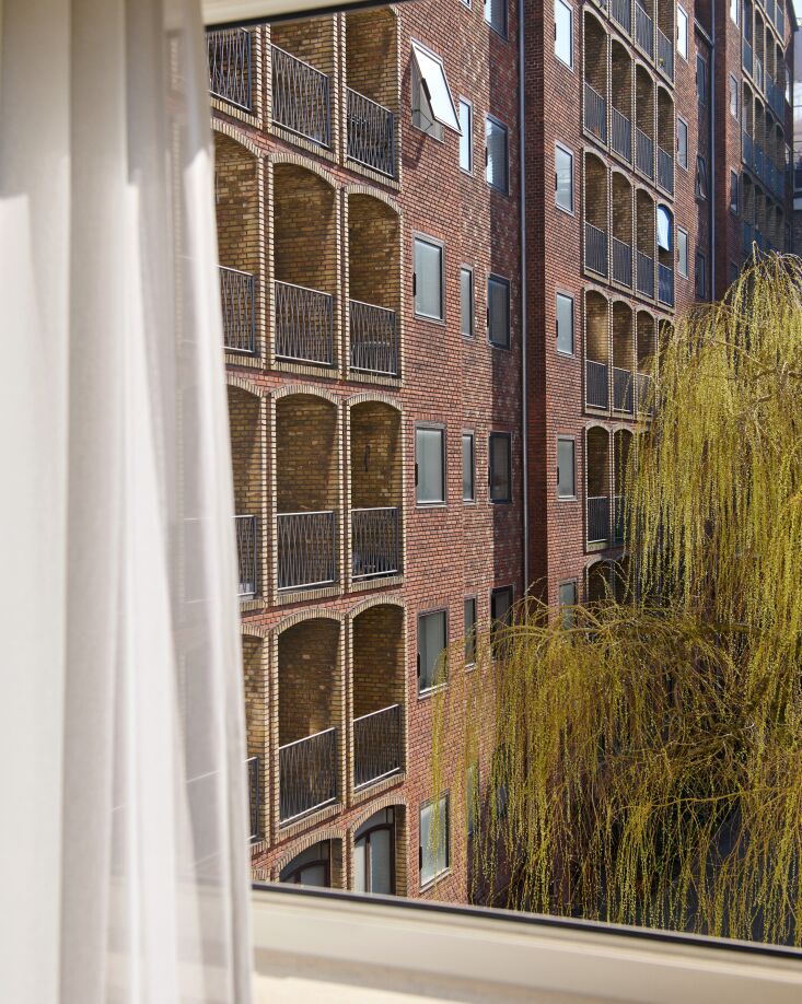 the building was originally constructed in red machine moulded brick with yello 30
