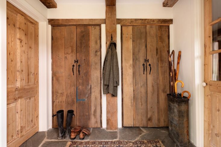 enter through the back door and there\2\17;s a custom built mudroom with 19