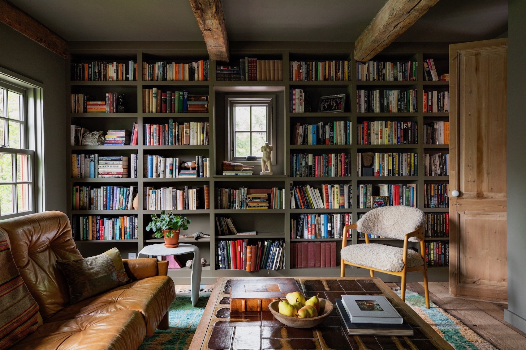 the library/tv room. the furnishings are vintage pieces, many of which travel w 21