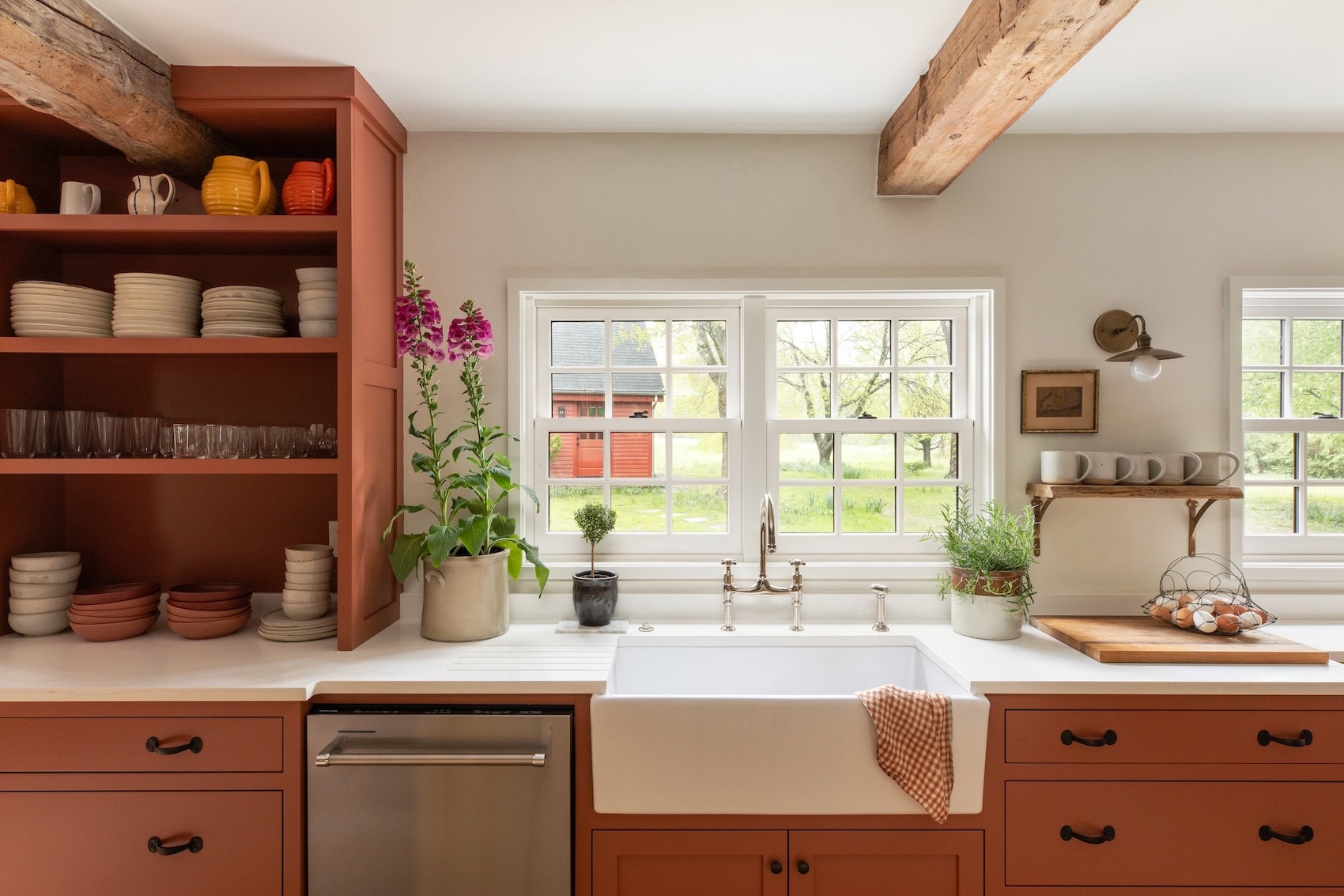 a farmhouse sink with a view. 24