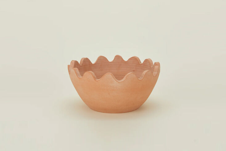 this scalloped bowl is a pretty riff on the humble garden pot. just add greens. 17