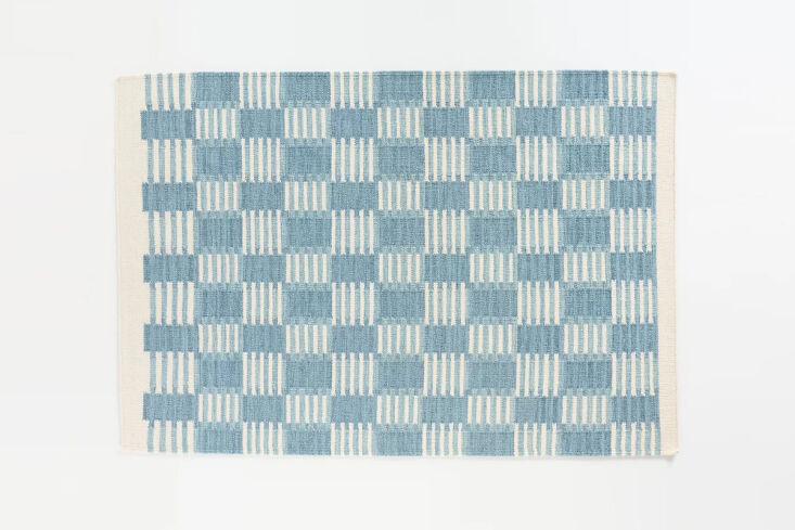 the handwoven wool scandi checkerboard rug adopts a familiar scandinavian patte 20