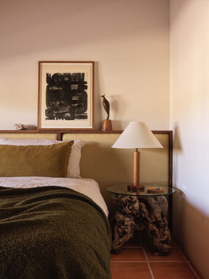 the palette channels the high desert, with terra cotta floors and muted greens. 22