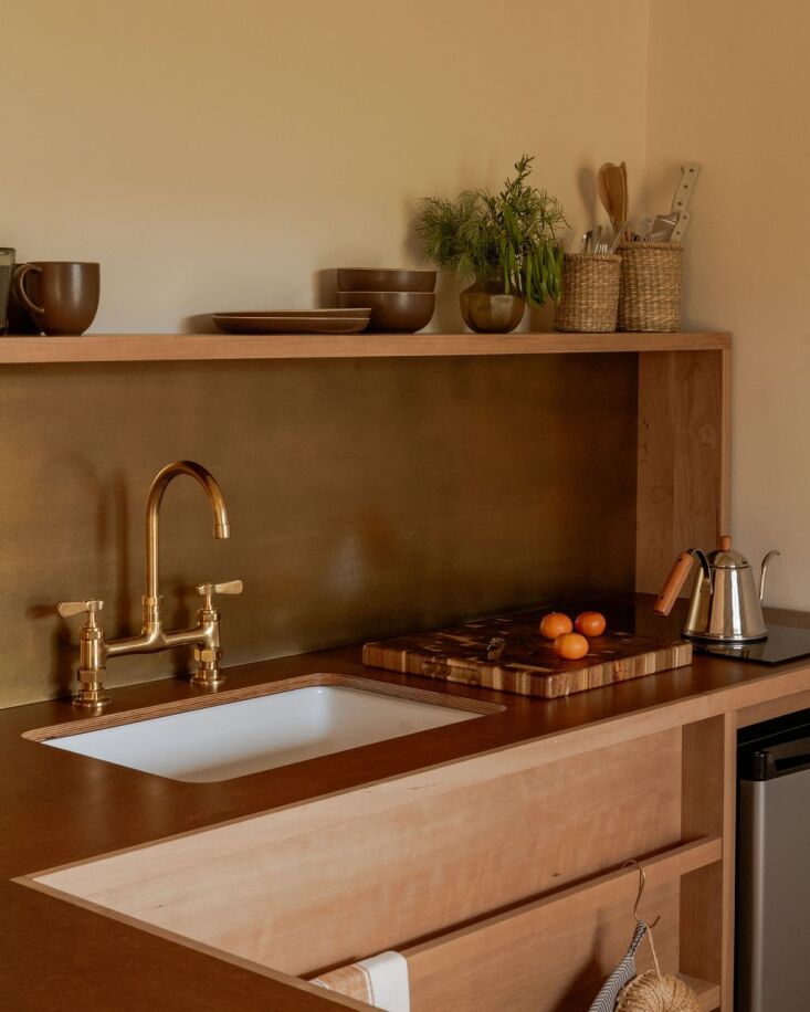 rooms have kitchenettes and private patios. 26